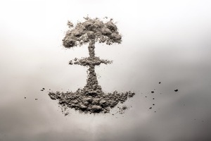 A formation of gray ash resembling a mushroom cloud or tree on a white to dark gray gradient background.
